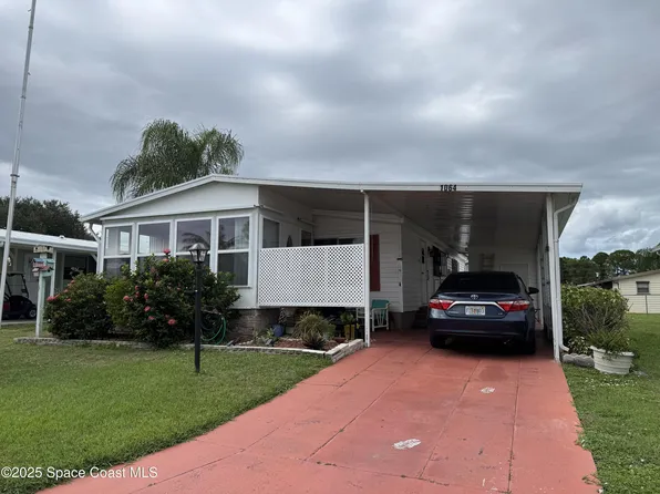 1064 Royal Palm Dr, Barefoot Bay, FL 32976