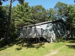 8603 Paw Paw Trl, Howard City, MI 49329