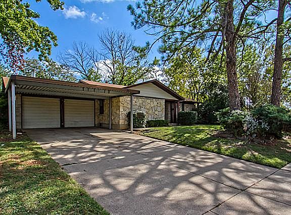 Convenient north Euless home in park-like setting.