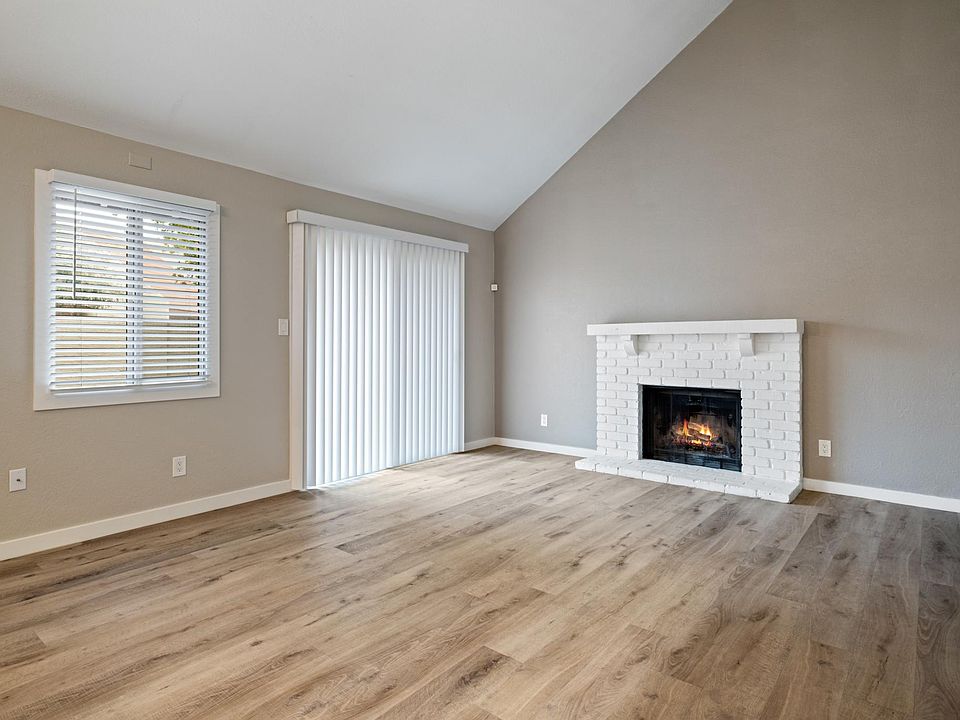 Living/Family Room w/ Fireplace and Patio Sliding Door