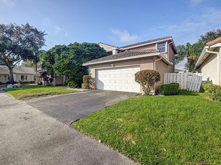 9581 NW 9th Ct — Photo 42