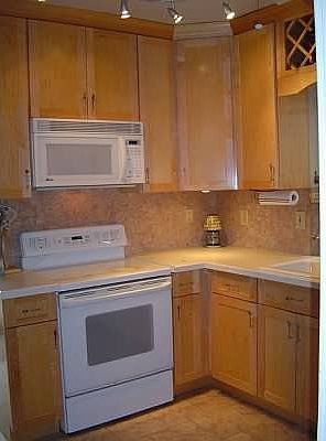 renovated kitchen with smooth cooktop, new microwave and ran