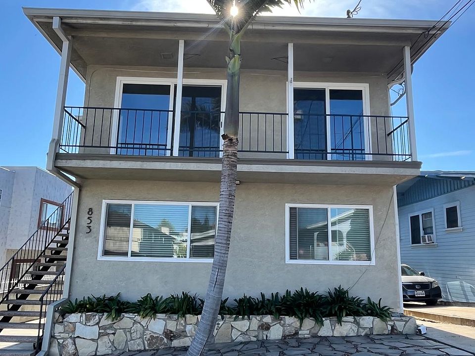 Upstairs front unit 3 showing two new double pane sliding glass doors