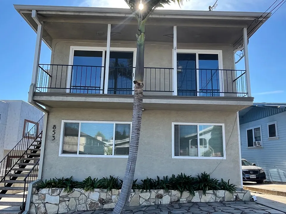 Upstairs front unit 3 showing two new double pane sliding glass doors