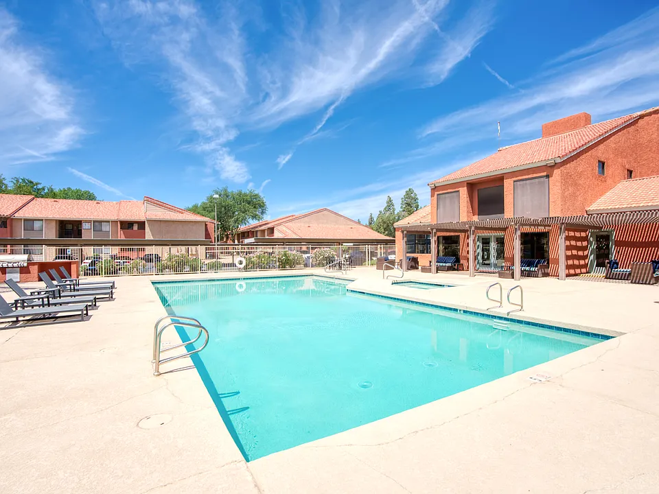 Two resort style swimming pools with cabanas and grills