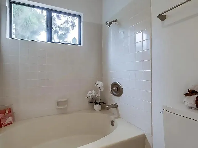 Ensuite primary bathroom to primary bedroom, with extra large tub and shower.