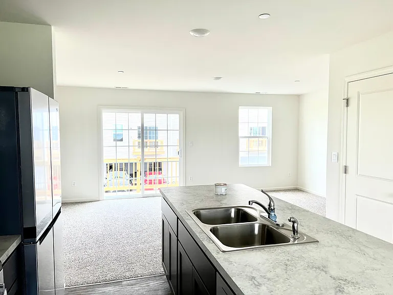 Kitchen looking into Living Room