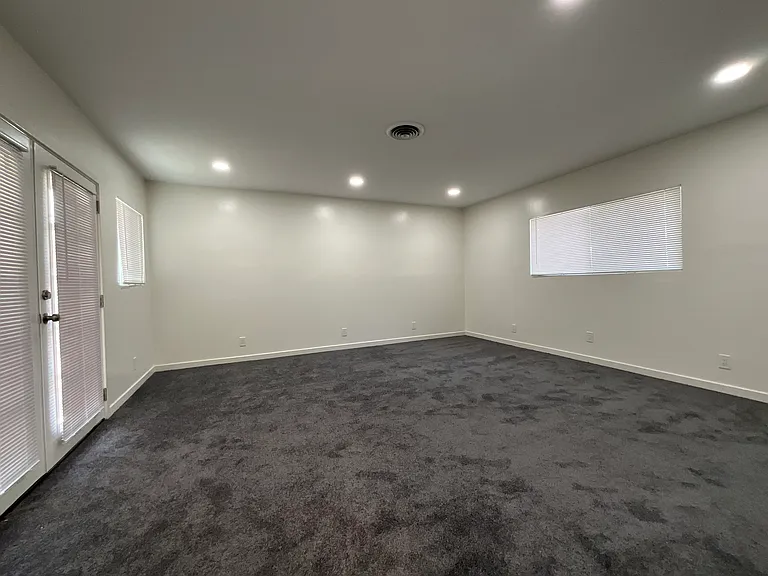 Very large master with sliders to the patio