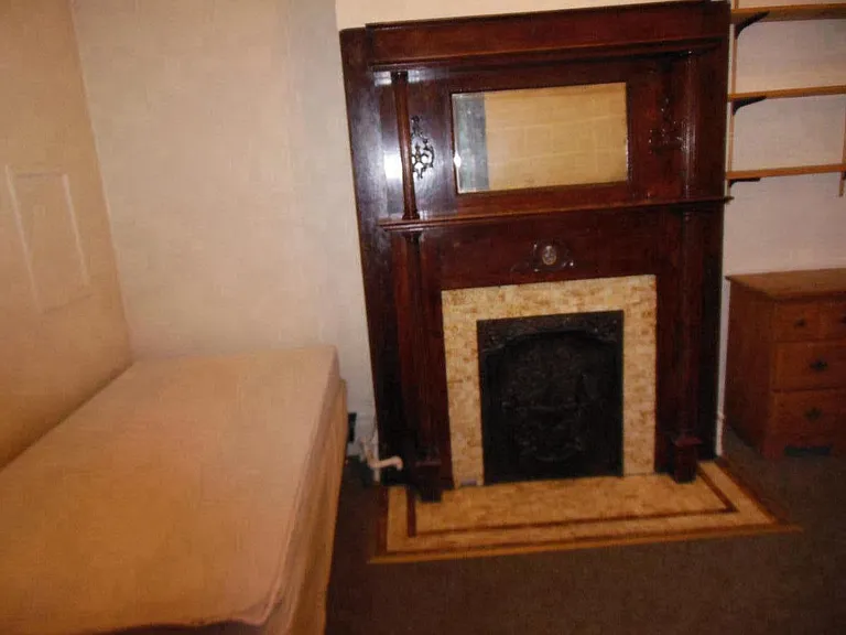 Example of small size bedroom - furnished with bed, 2 chest