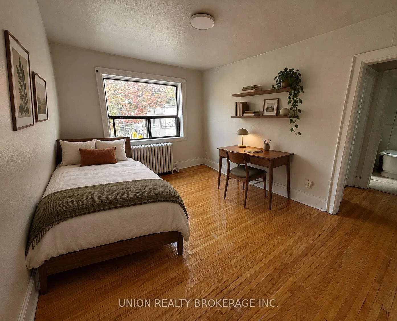 2451 Queen St E — Photo 1