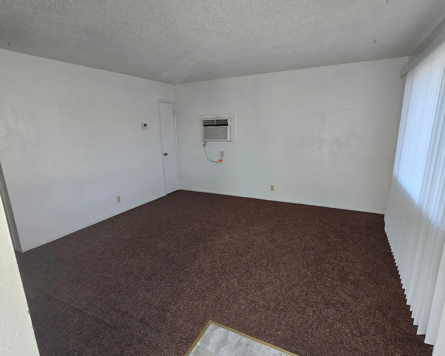 4 Plex With A Carport Space Move In Special $200.00 Off First Month Rent — Photo 3