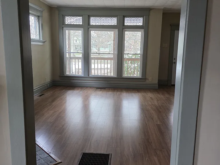 View into the living room toward the front door.