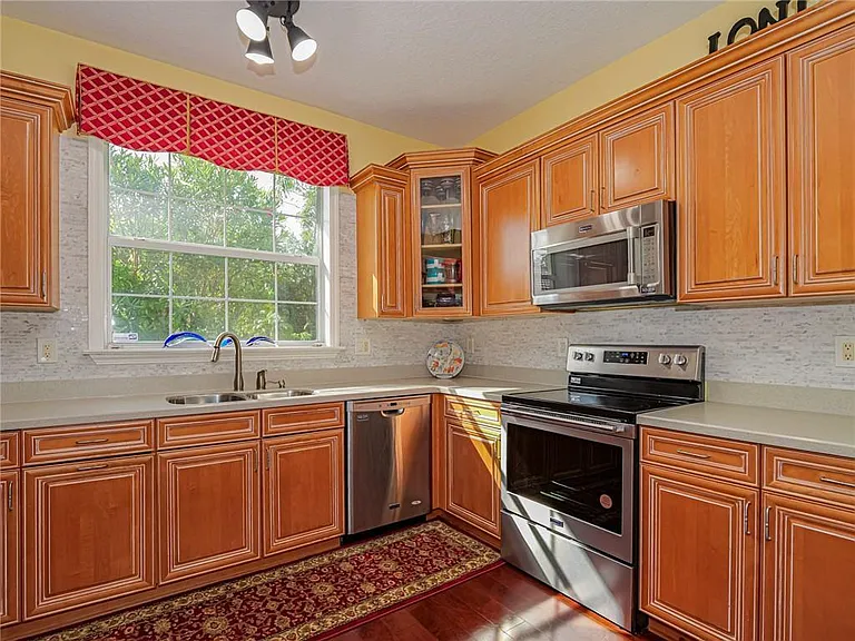 5873 Pine Ridge Cir — Photo 12