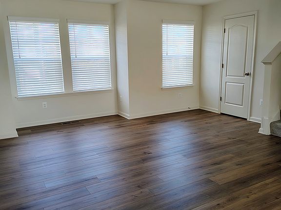 Living room with half bathroom
