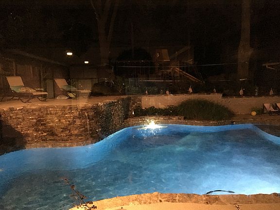 Pool lit bright at night!