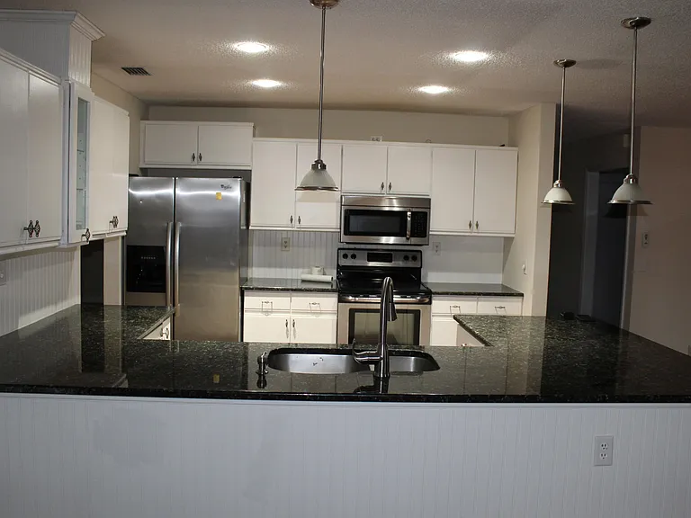 13880 Paddock Dr — Photo 3