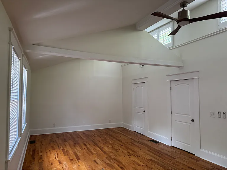2 fans + high ceilings in primary bedroom.