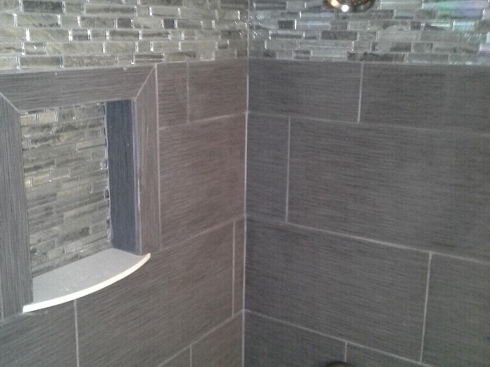 New slate shower with glass accent tile