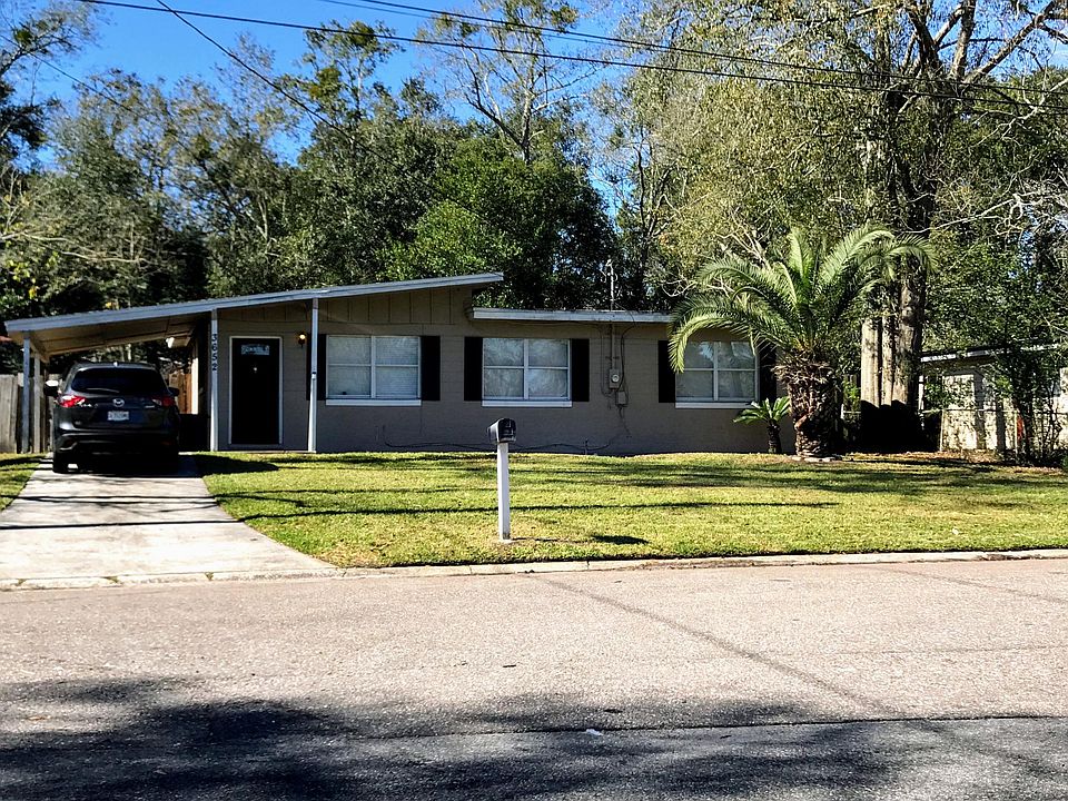 Front of house with carport. Quite Neighborhood and prefect for older couple and small families. Walking distance to shopping and transportation.