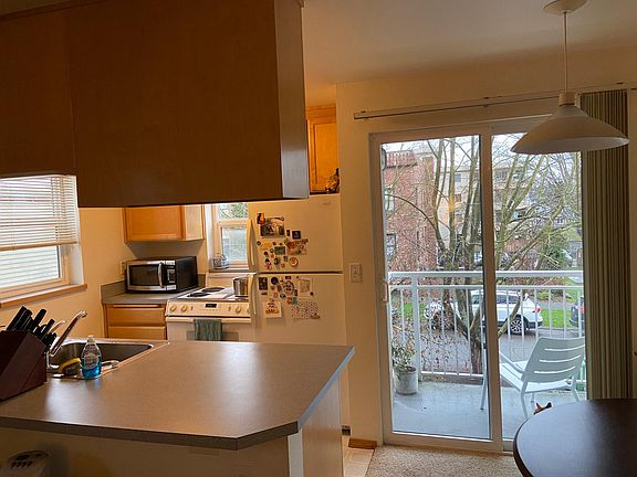 Full sliding glass doors open to private balcony