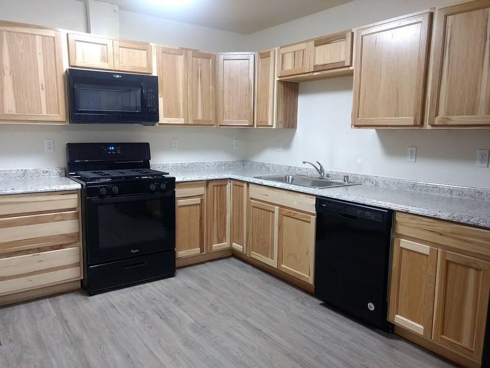 Hickory cabinets with grey floors