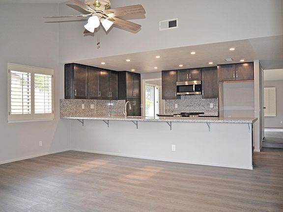 Family room view to kitchen
Fan in family room