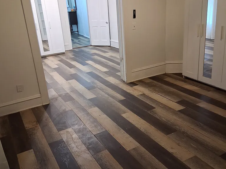 front bedroom view with frosted French doors open into middle bedroom