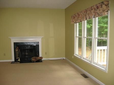 Large living room w/cozy fireplace.