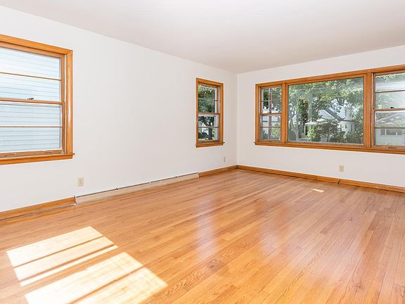 Large living room with hardwood floors.