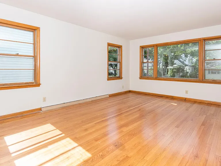 Large living room with hardwood floors.