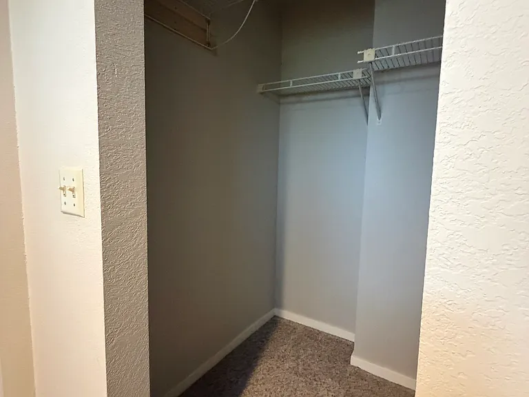 second view of walk in closet