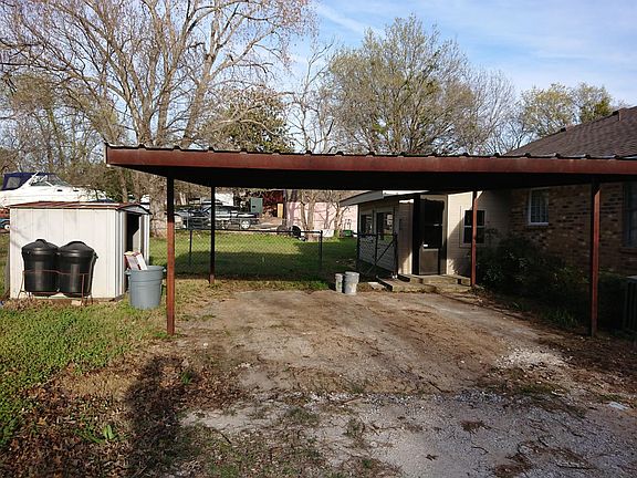 Back of house, carport and shed