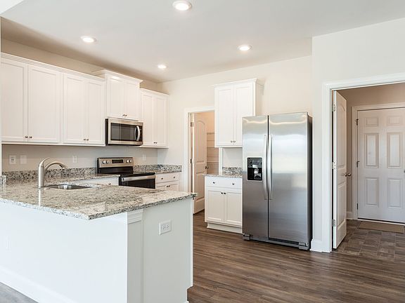 Stainless steel kitchen appliances are included