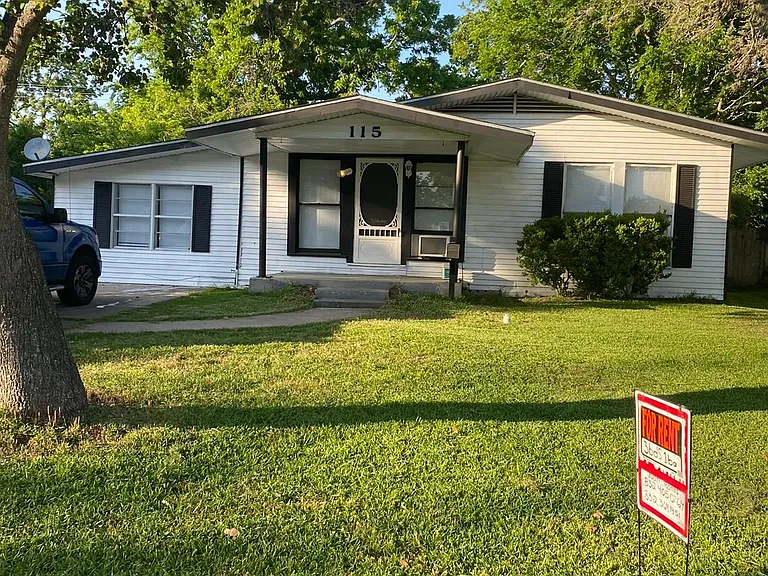 Front view of the house and yard