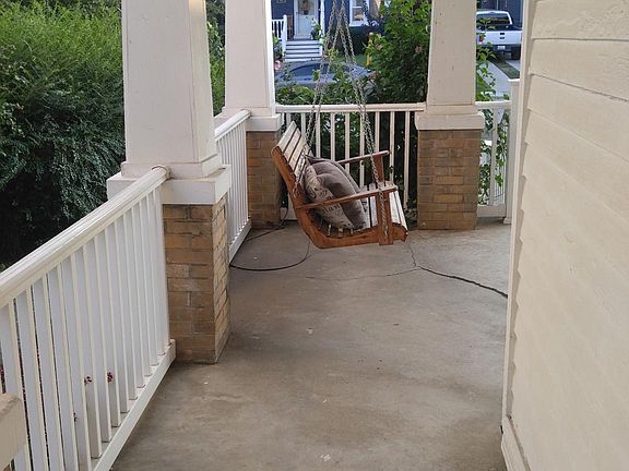 Front porch with relaxing swing