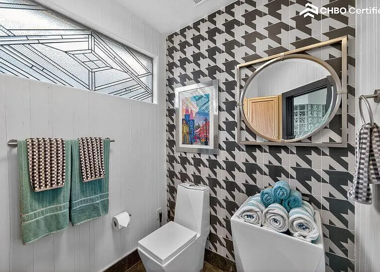 Separate water closet with linen storage