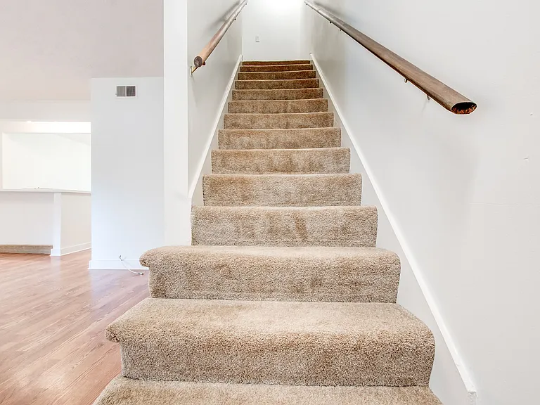 Going upstairs to the bedrooms and the bathroom