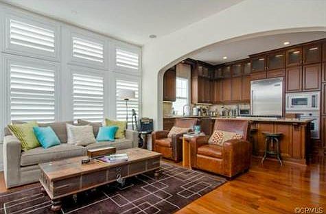 Warm and inviting open floorplan. Livingroom opens to gourmet Ch