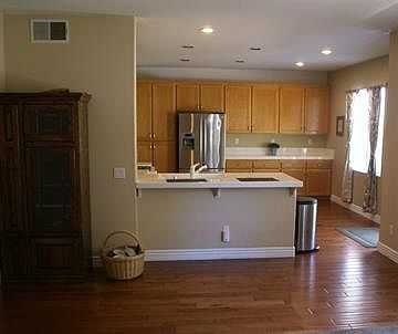 kitchen adjoins family room