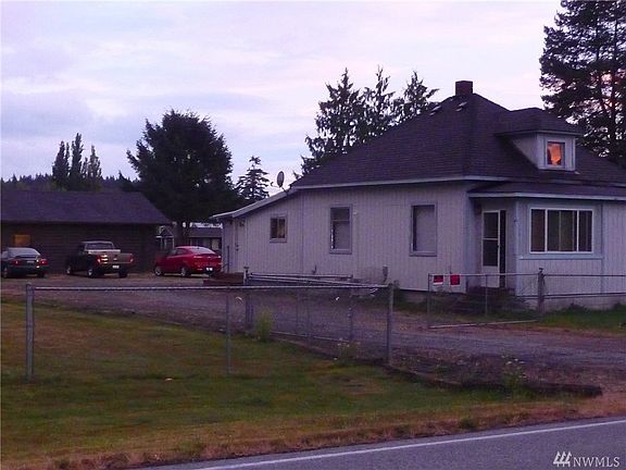Front of house w/1,200 SF detached garage. New roof on both.