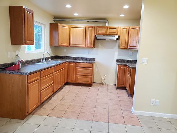 A NICE WINDOW OVER THE KITCHEN SINK MAKES THE KITCHEN CLEANUP A LOT EASIER!