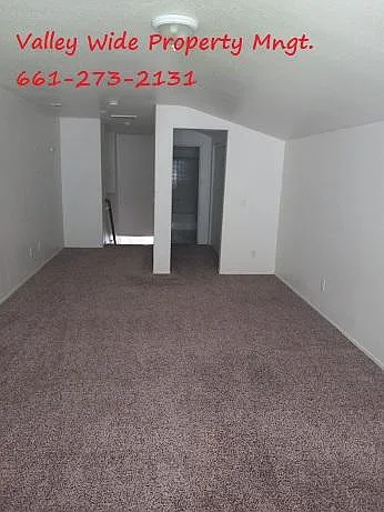upstairs 3rd bedroom looking toward closet and private bathroom
