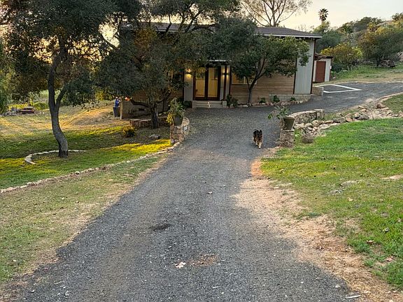 Long driveway to house.