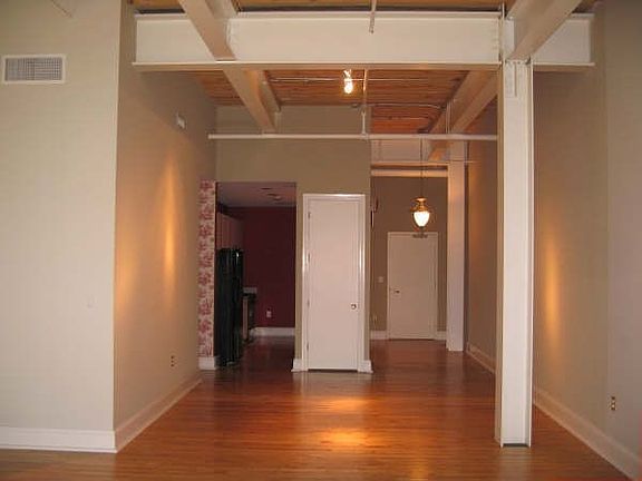 View of the entrance and kitchen.