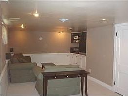 new family room, new carpet, paint, wanes coating and canister lights