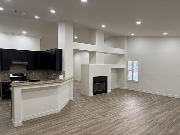 2nd living area and kitchen.