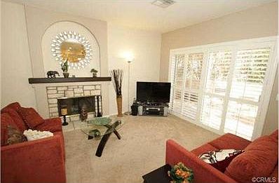 Living Room has a slider that opens to the lovely, super private