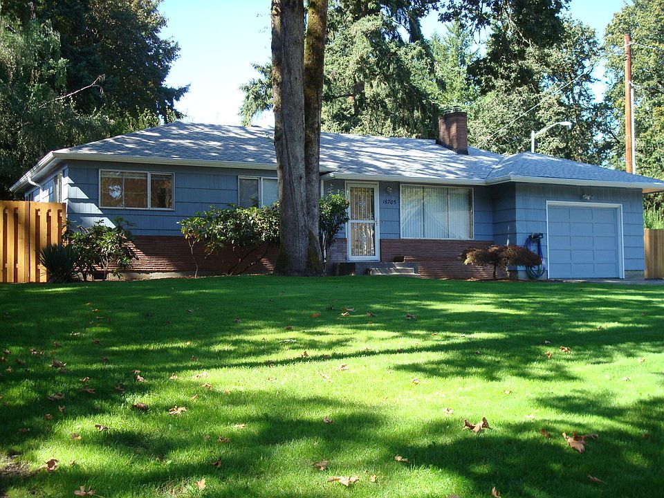 Beautiful Neighborhood. House is placed on a relatively large piece of property in a Park Like setting. Located Near Rex Putnam High School.