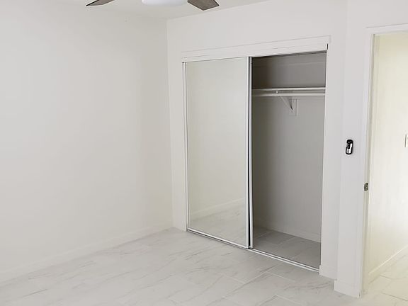 Spacious bedrooms with ample storage space.