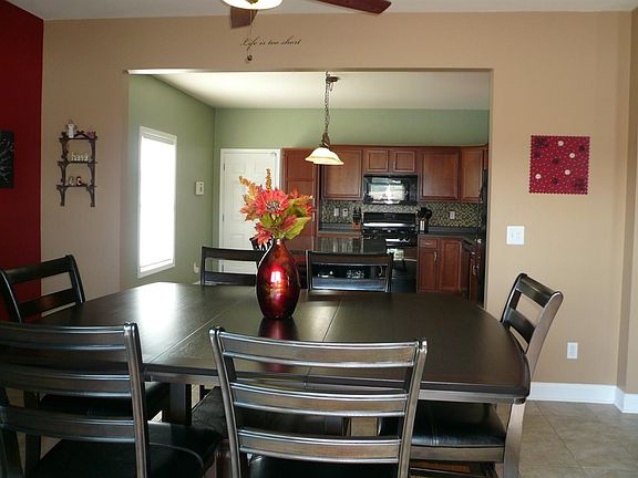 Kitchen opens for formal dining room.